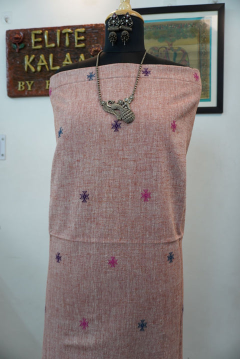 Peach Bhujodi Kala kurti fabric with front chomuk work and multicolor placement pattern in blue and purple