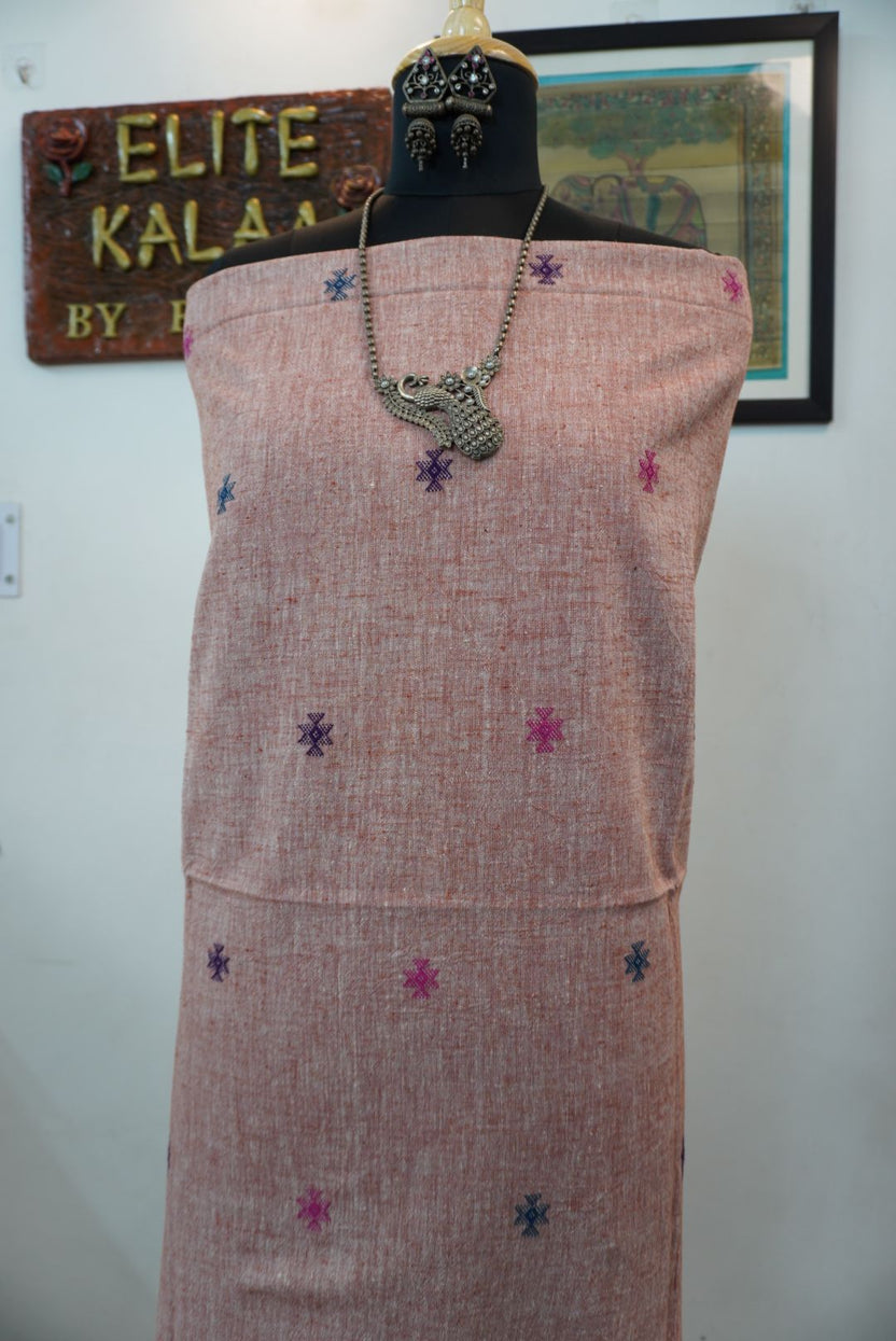Peach Bhujodi Kala kurti fabric with front chomuk work and multicolor placement pattern in blue and purple
