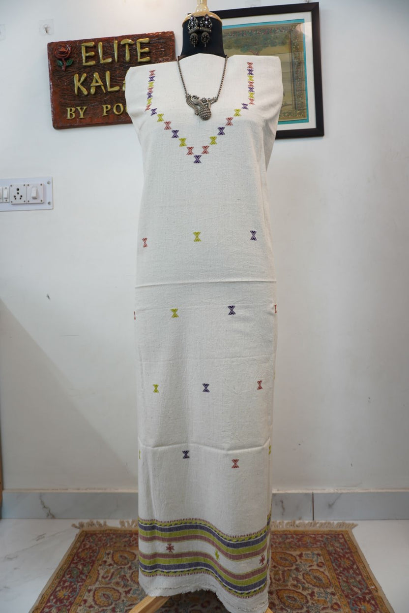 Off white Bhujodi Kala cotton kurti with multicolor placement pattern, neck chomuk and daaman work, and border
