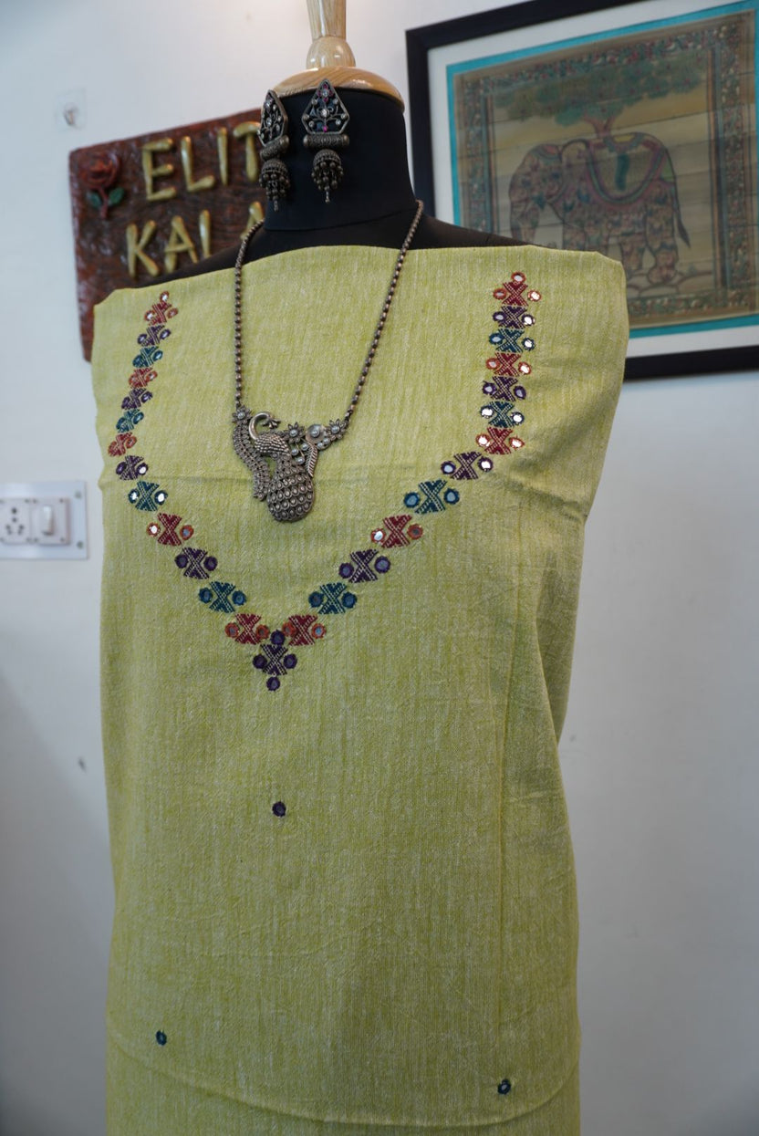 Olive green Bhujodi kala cotton kurti with neck chomuk design, multicolor detailing and mirror work