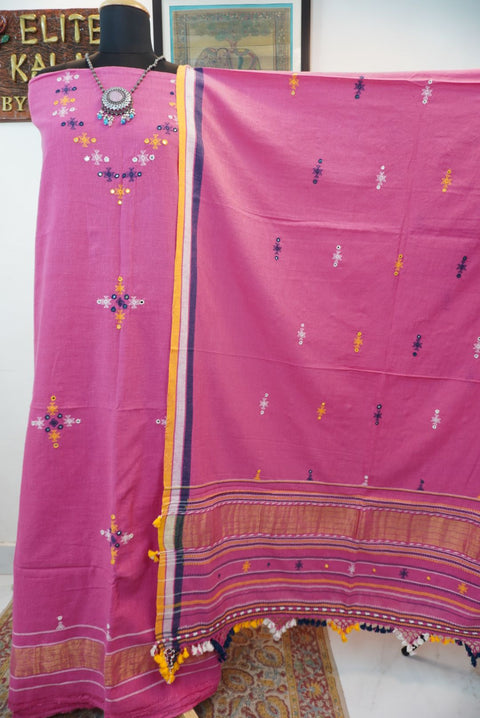 Pink Bhujodi kala cotton 3 pc dress material with yellow, purple and white placement pattern, border and tassels