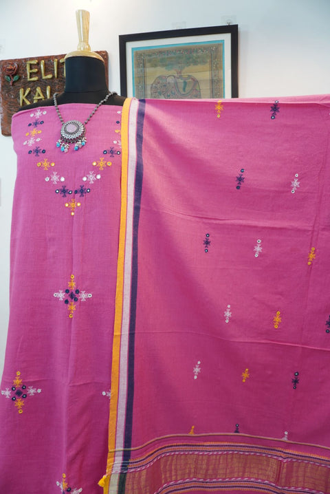 Pink Bhujodi kala cotton 3 pc dress material with yellow, purple and white placement pattern, border and tassels