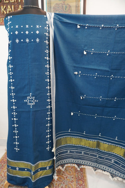 Teal blue 3 pc dress material with white and green placement pattern, border, tassels and fringe