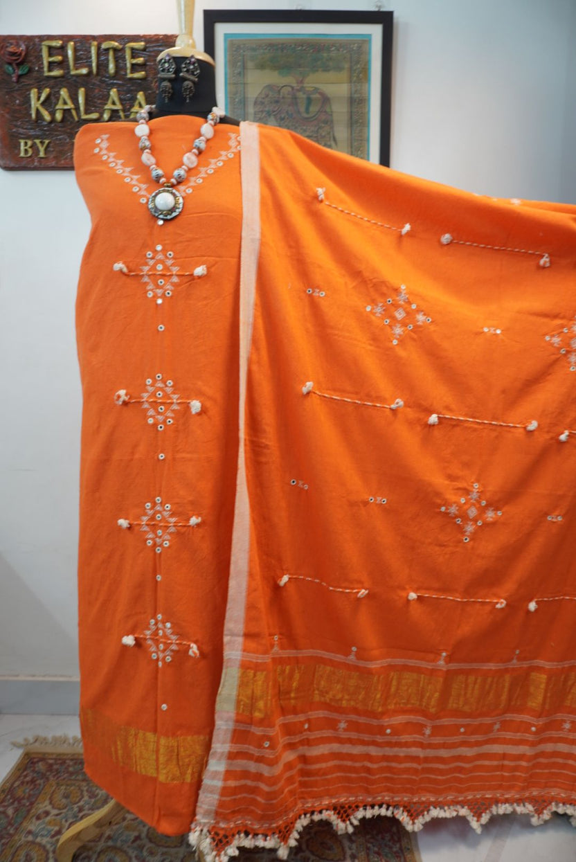 Orange Bhujodi kala cotton 3 piece suit with border, mirror work, tassels and fringe