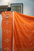 Orange Bhujodi kala cotton 3 piece suit with border, mirror work, tassels and fringe