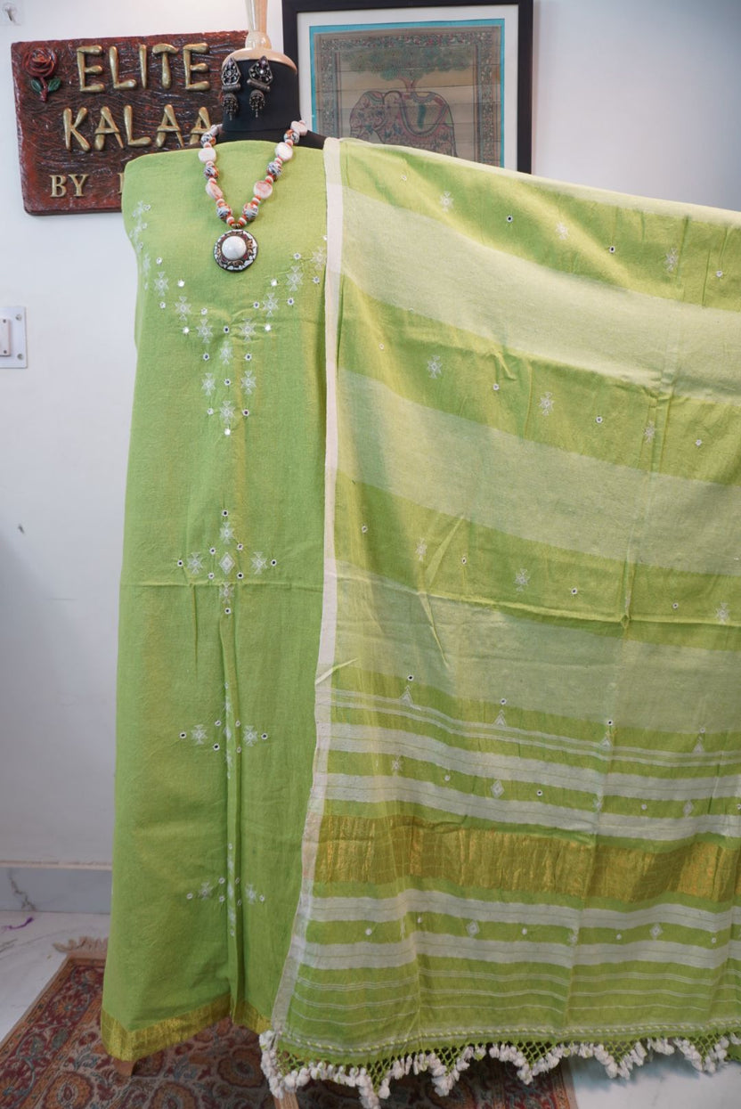 Bhujodi kala cotton 3 piece dress material in parrot green with border, tassels and fringe