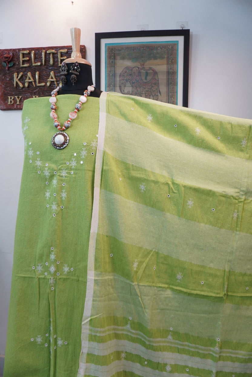 Bhujodi kala cotton 3 piece dress material in parrot green with border, tassels and fringe