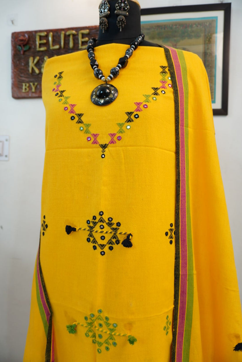 Yellow Bhujodi kala cotton suit fabric with multicolour placement pattern, border, tassels and fringe