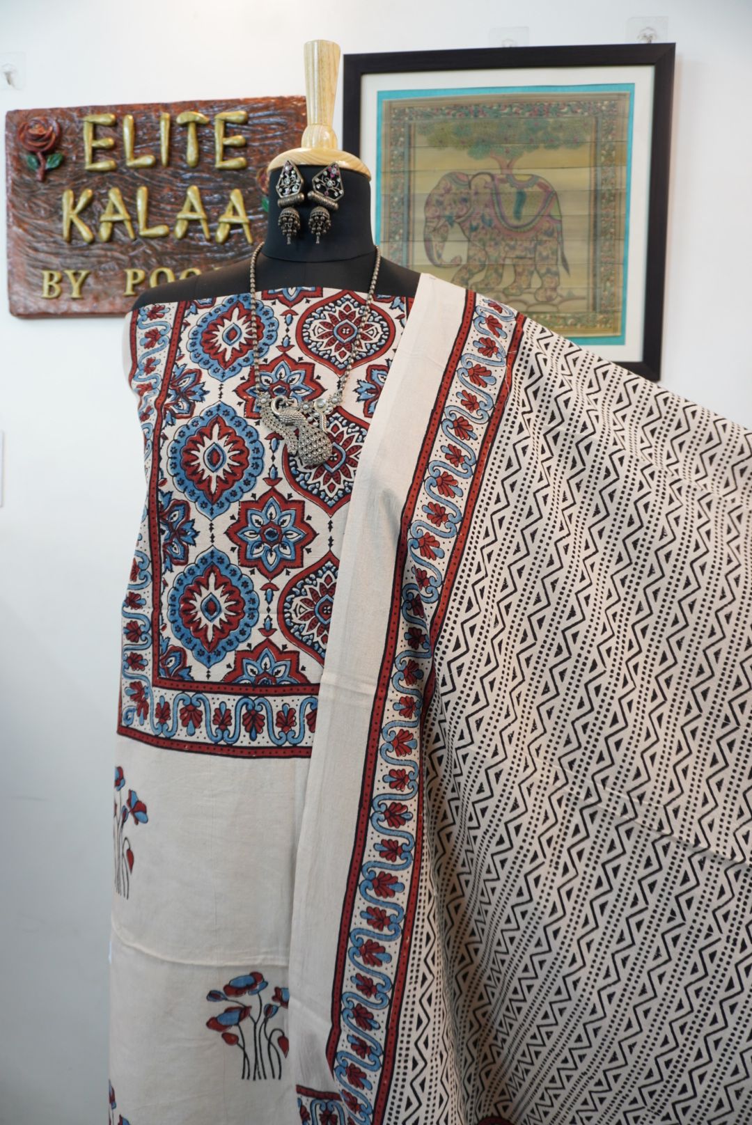 Ivory cotton Ajrakh handblock 3 piece suit set with all-over red, blue and black pattern and border