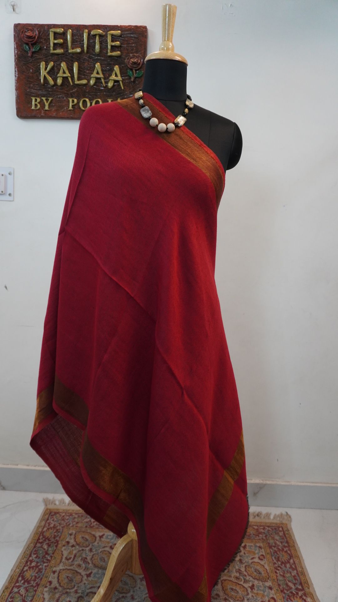 Red fine wool reversible stole with zari detailing and a border