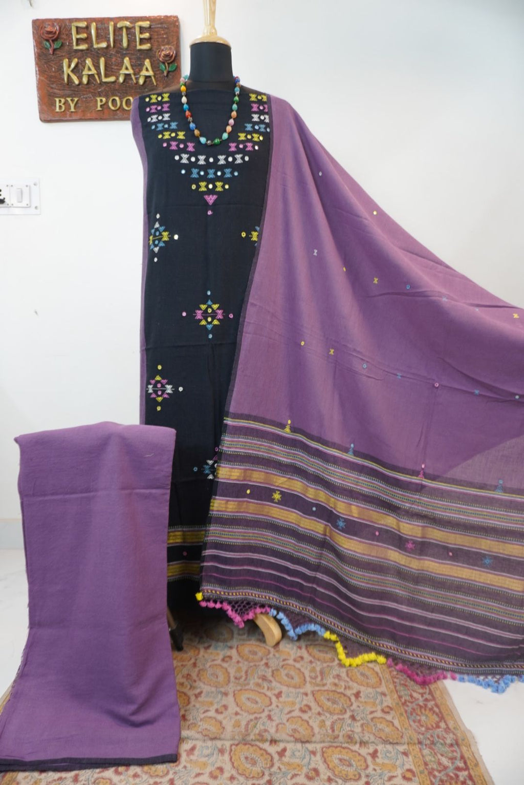 Black Kala Cotton Bhujodi 3 piece unstitched suit set with purple detailing, border and tassels