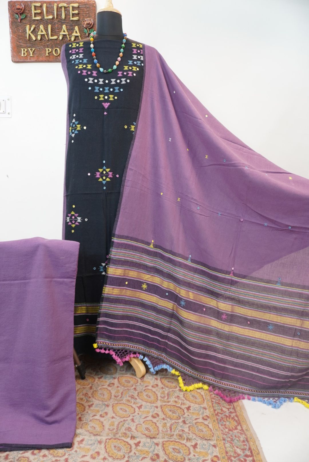 Black Kala Cotton Bhujodi 3 piece unstitched suit set with purple detailing, border and tassels