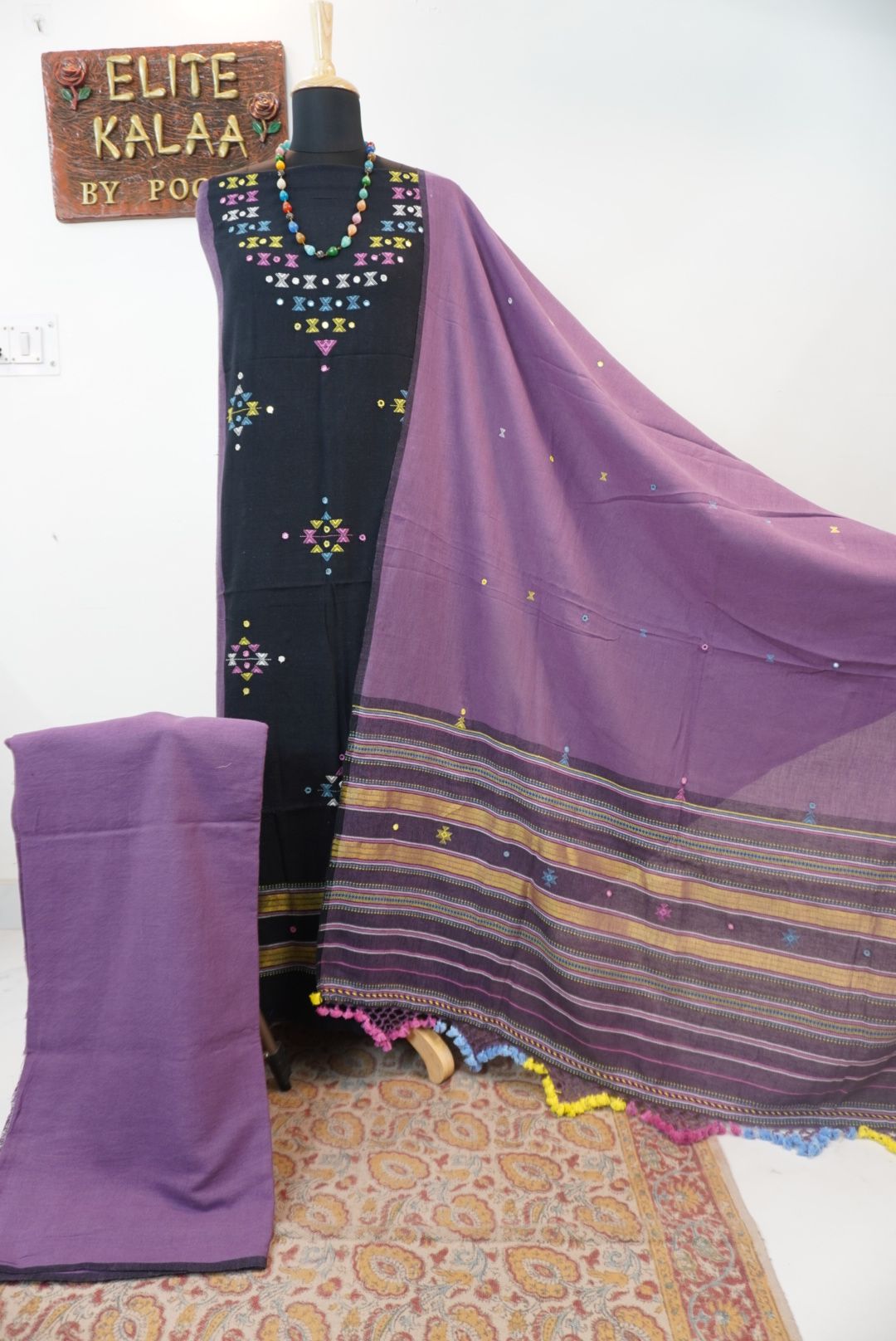 Black Kala Cotton Bhujodi 3 piece unstitched suit set with purple detailing, border and tassels