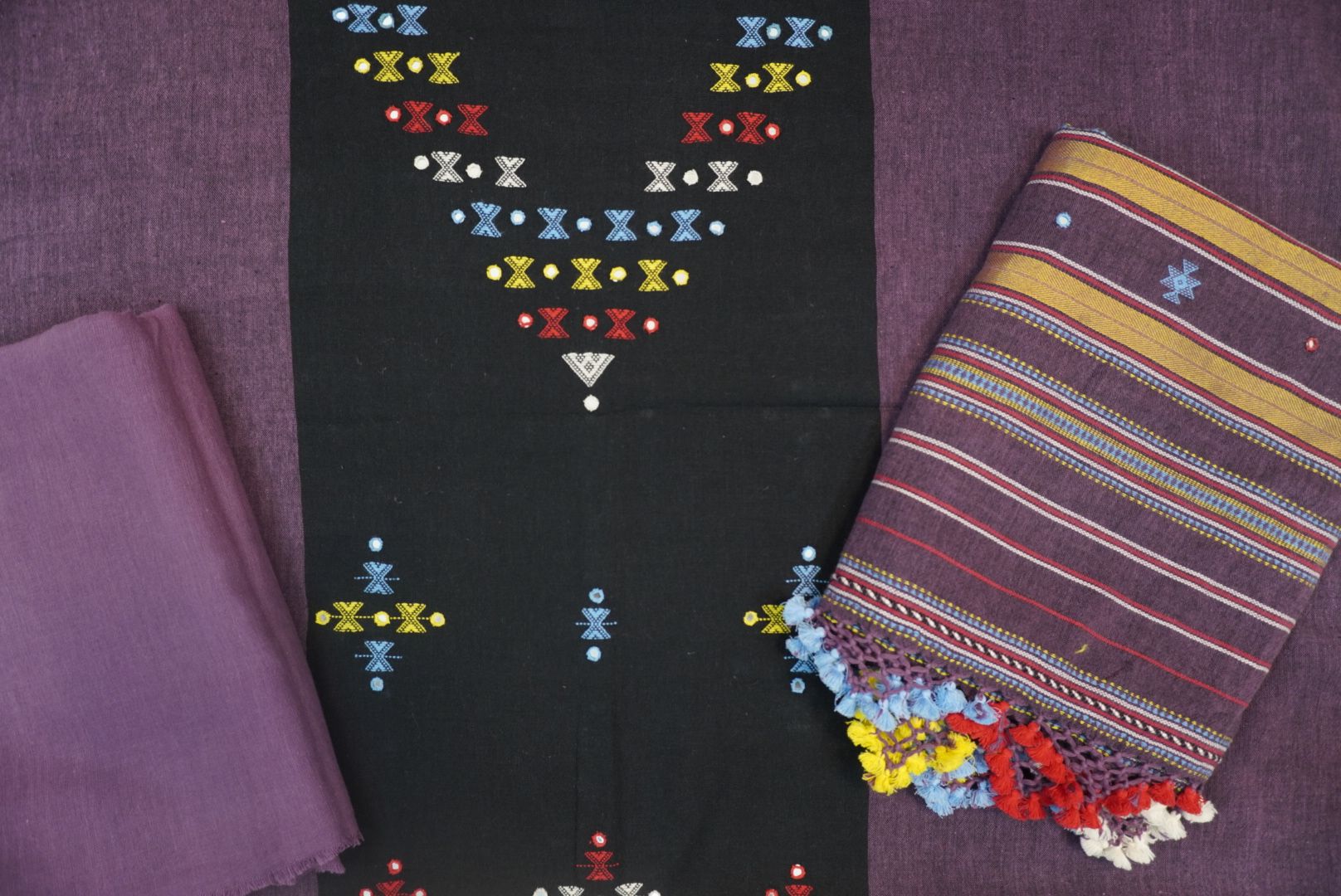 Black Kala Cotton Bhujodi 3-piece unstitched suit set with placement pattern, border, fringes and tassels