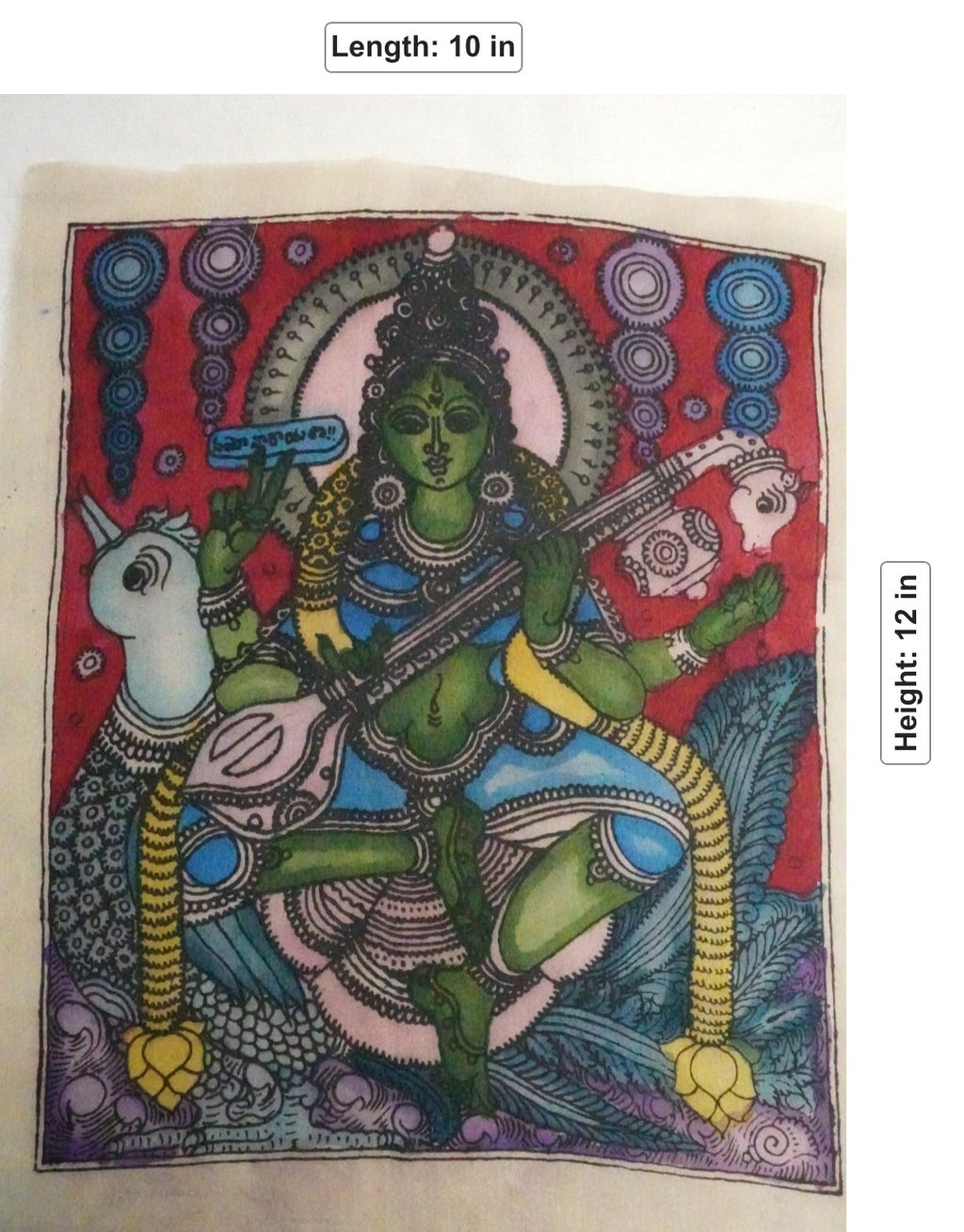 Red figurative Kalamkari patch with Saraswati and Veena design, shown with a border.