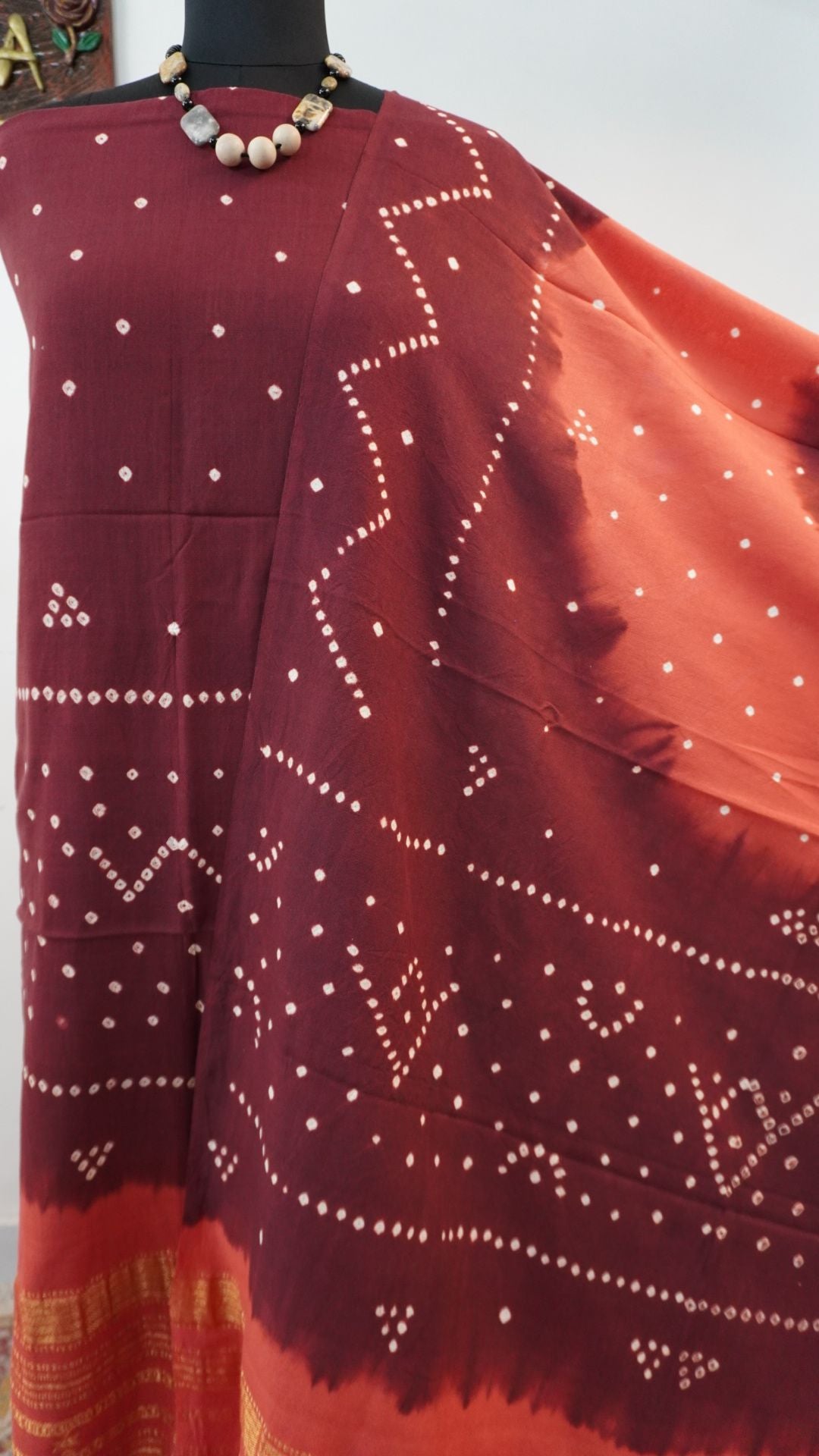 Ajrakh handblock bandhni 2 piece suit in carrot pink and maroon with border, tassels and zari detailing