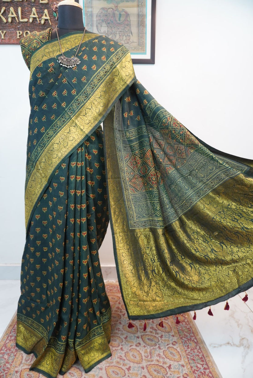Green Dola silk Ajrakh block print saree with zari detail, border and tassels