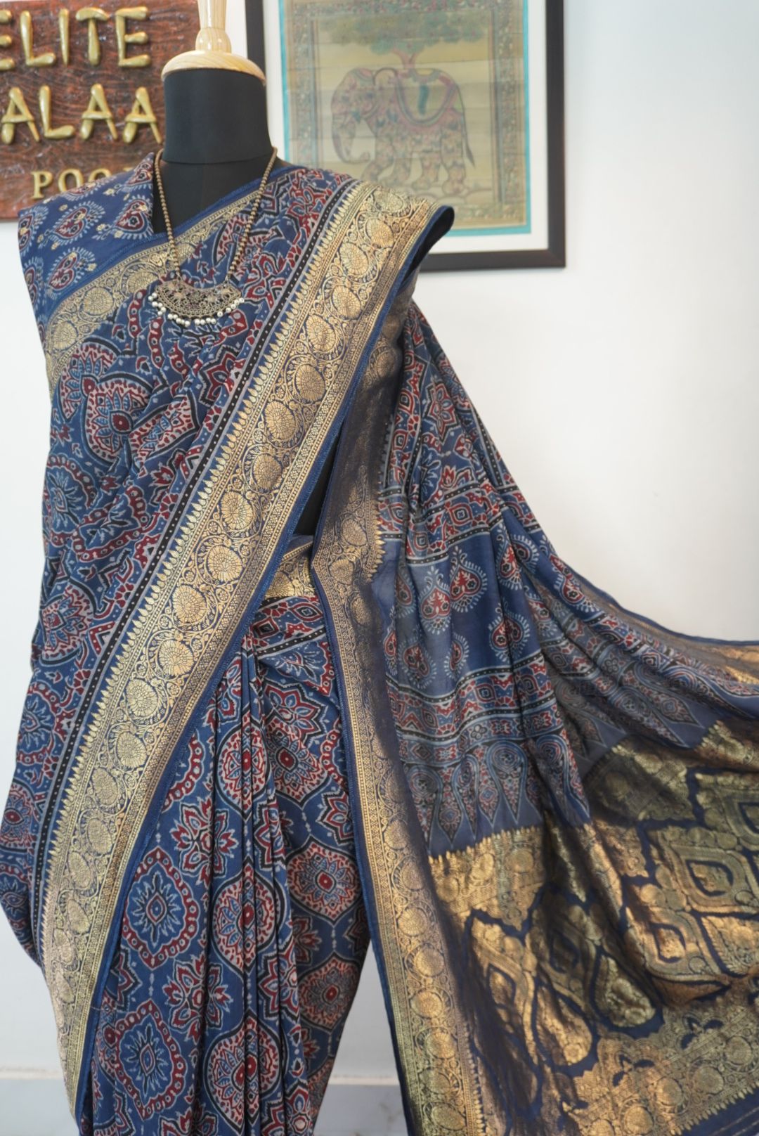 Blue Dola silk Ajrakh saree with multicolor placement pattern, border and zari accents