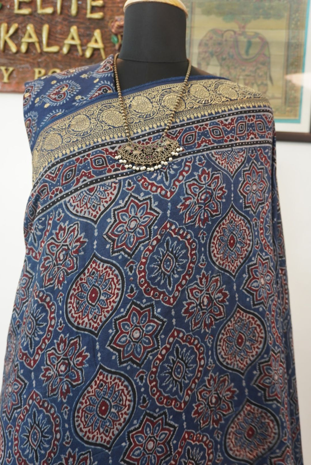 Blue Dola silk Ajrakh saree with multicolor placement pattern, border and zari accents