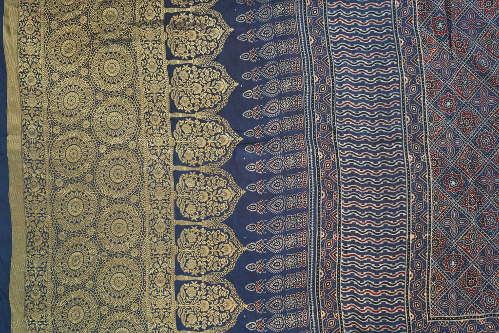 Blue Dola silk Ajrakh saree with multicolor placement pattern, border and zari accents