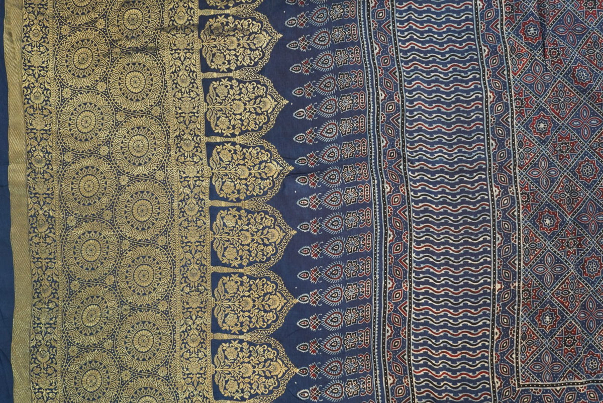 Blue Dola silk Ajrakh saree with multicolor placement pattern, border and zari accents