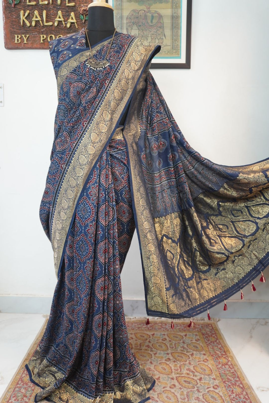 Blue Dola silk Ajrakh saree with multicolor placement pattern, border and zari accents