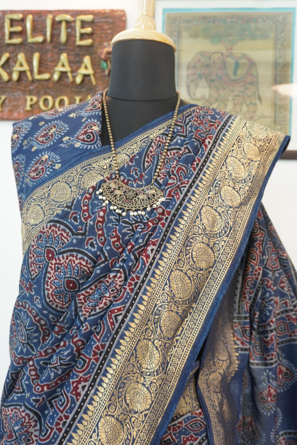 Blue Dola silk Ajrakh saree with multicolor placement pattern, border and zari accents