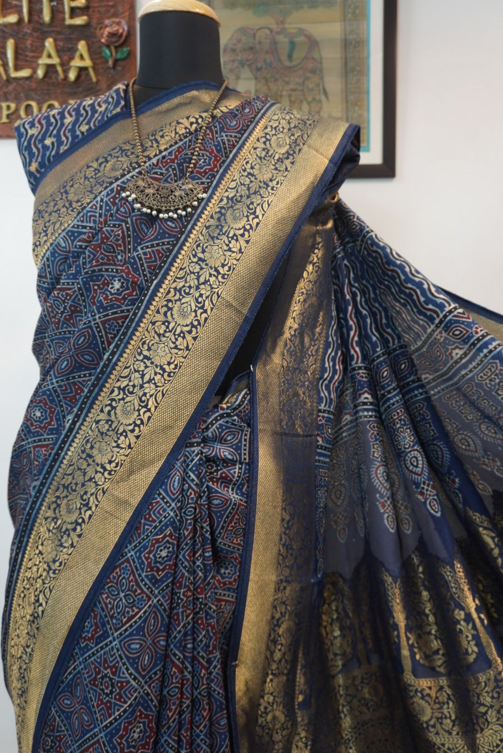 Blue Dola silk Ajrakh saree with multicolor placement pattern, border and zari accents