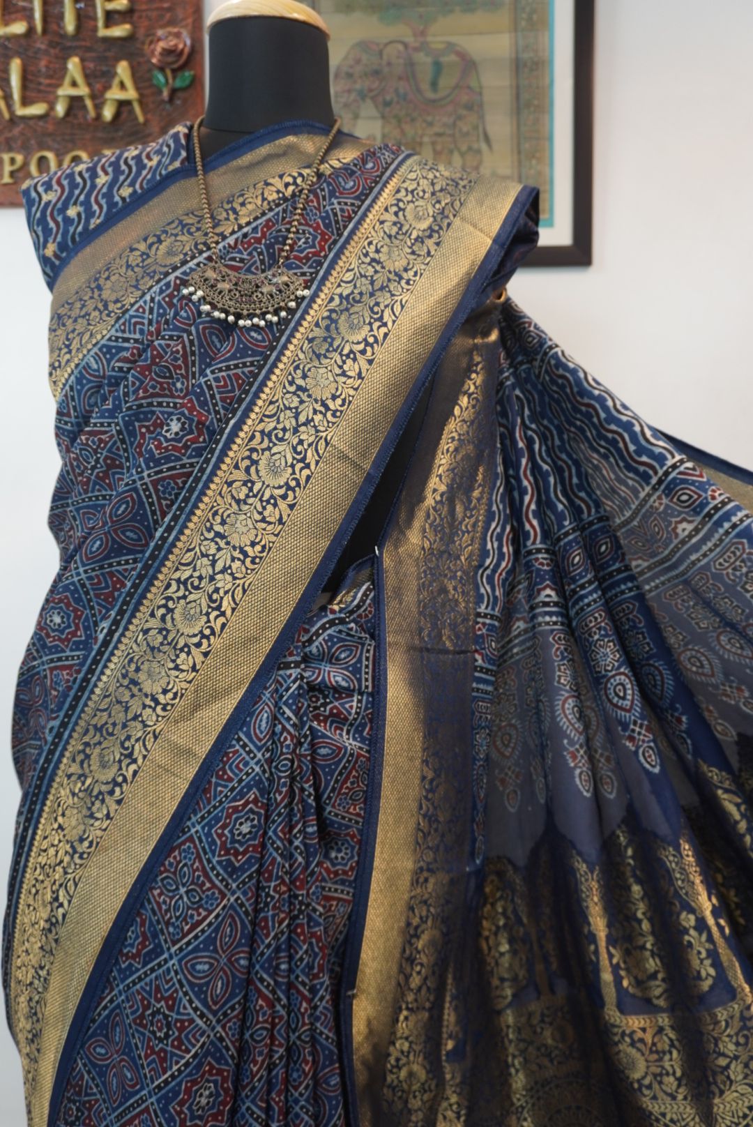 Blue Dola silk Ajrakh saree with multicolor placement pattern, border and zari accents