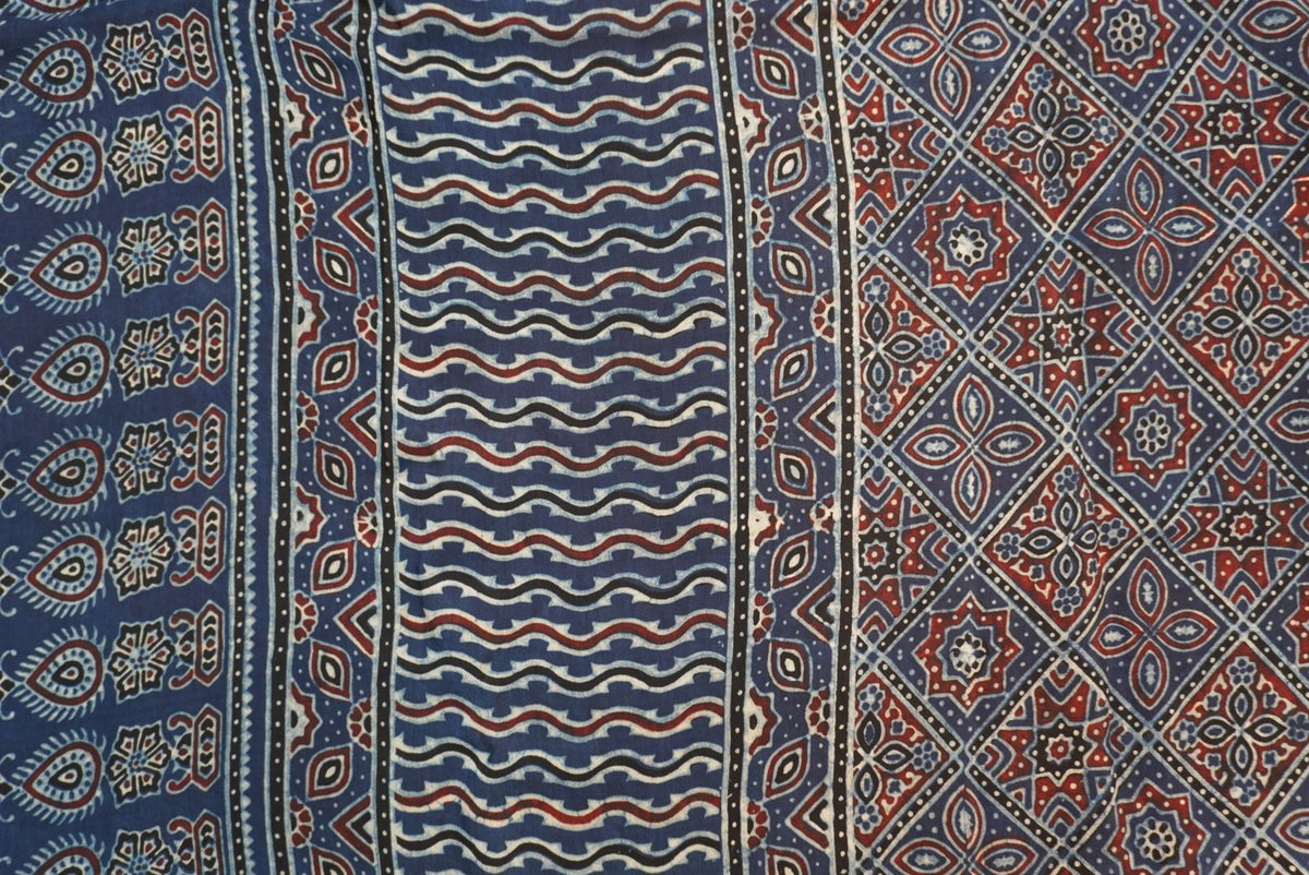 Blue Dola silk Ajrakh saree with multicolor placement pattern, border and zari accents