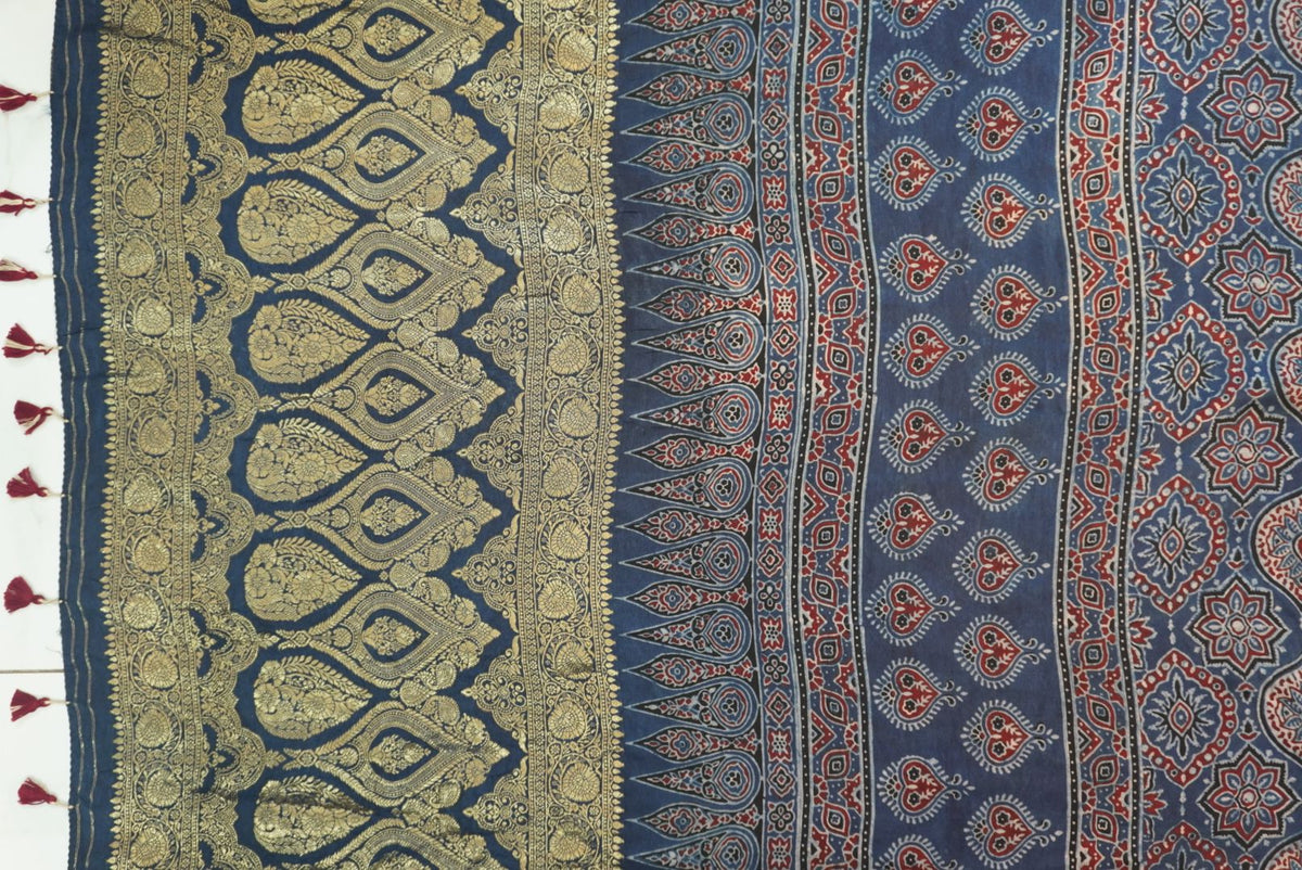 Blue Dola silk Ajrakh saree with multicolor placement pattern, border and zari accents