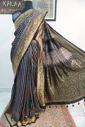 Dola silk Ajrakh handblock saree with multicolour striped design, border and tassels