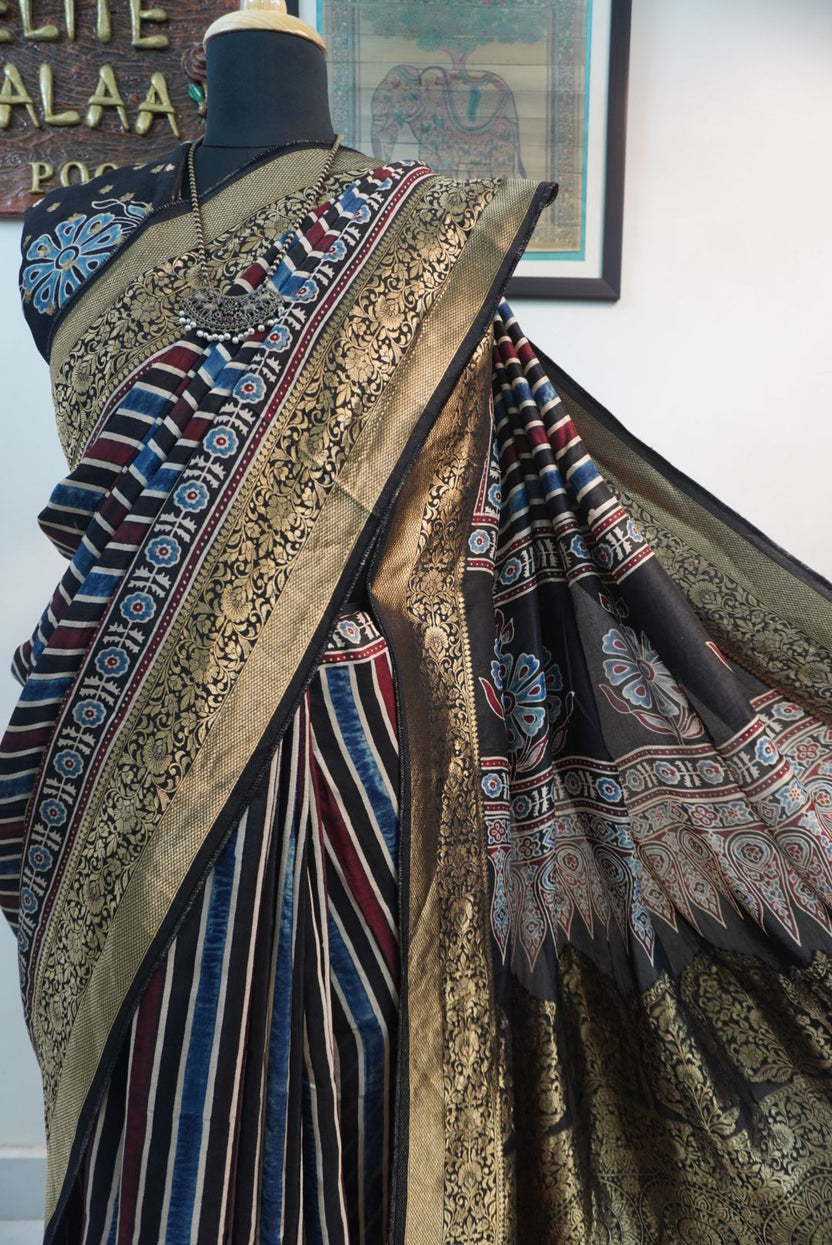 Dola silk Ajrakh handblock saree with multicolour striped design, border and tassels