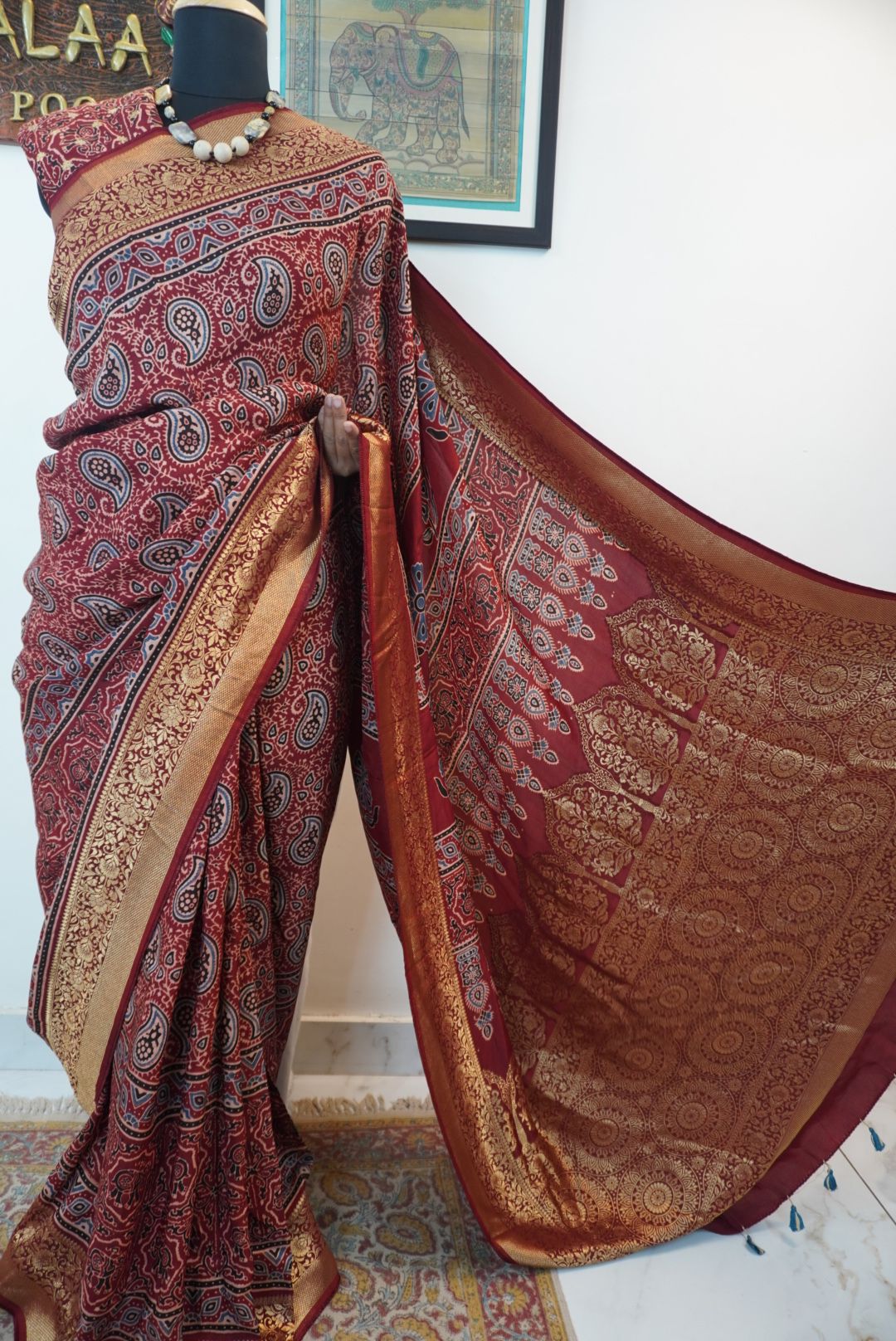 Dola silk ajrakh saree with floral nakshi pallu -  red