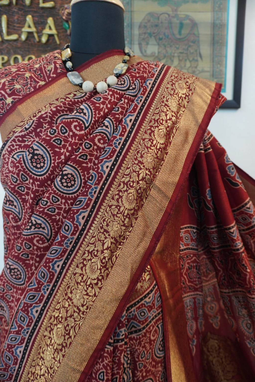 Dola silk ajrakh saree with floral nakshi pallu -  red