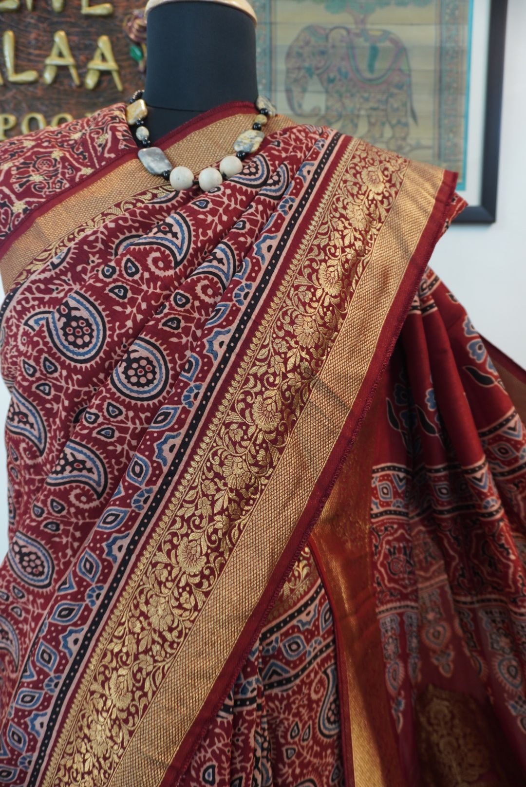 Dola silk ajrakh saree with floral nakshi pallu -  red