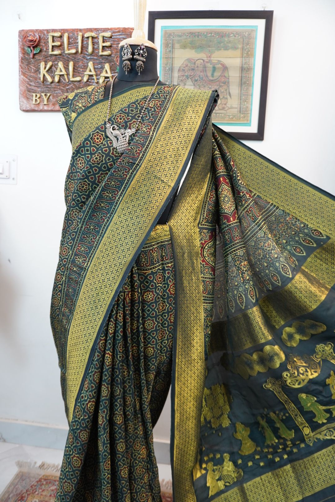 Dola silk ajrakh saree with meenakari palla - green