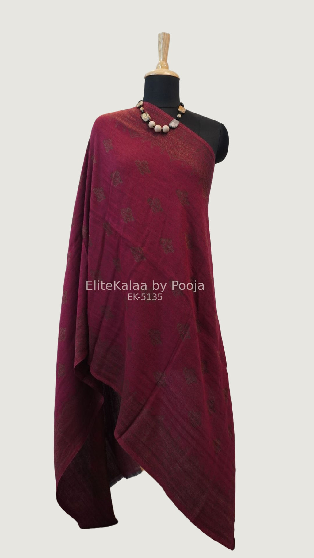 Deep maroon fine wool stole with self zari leaf design