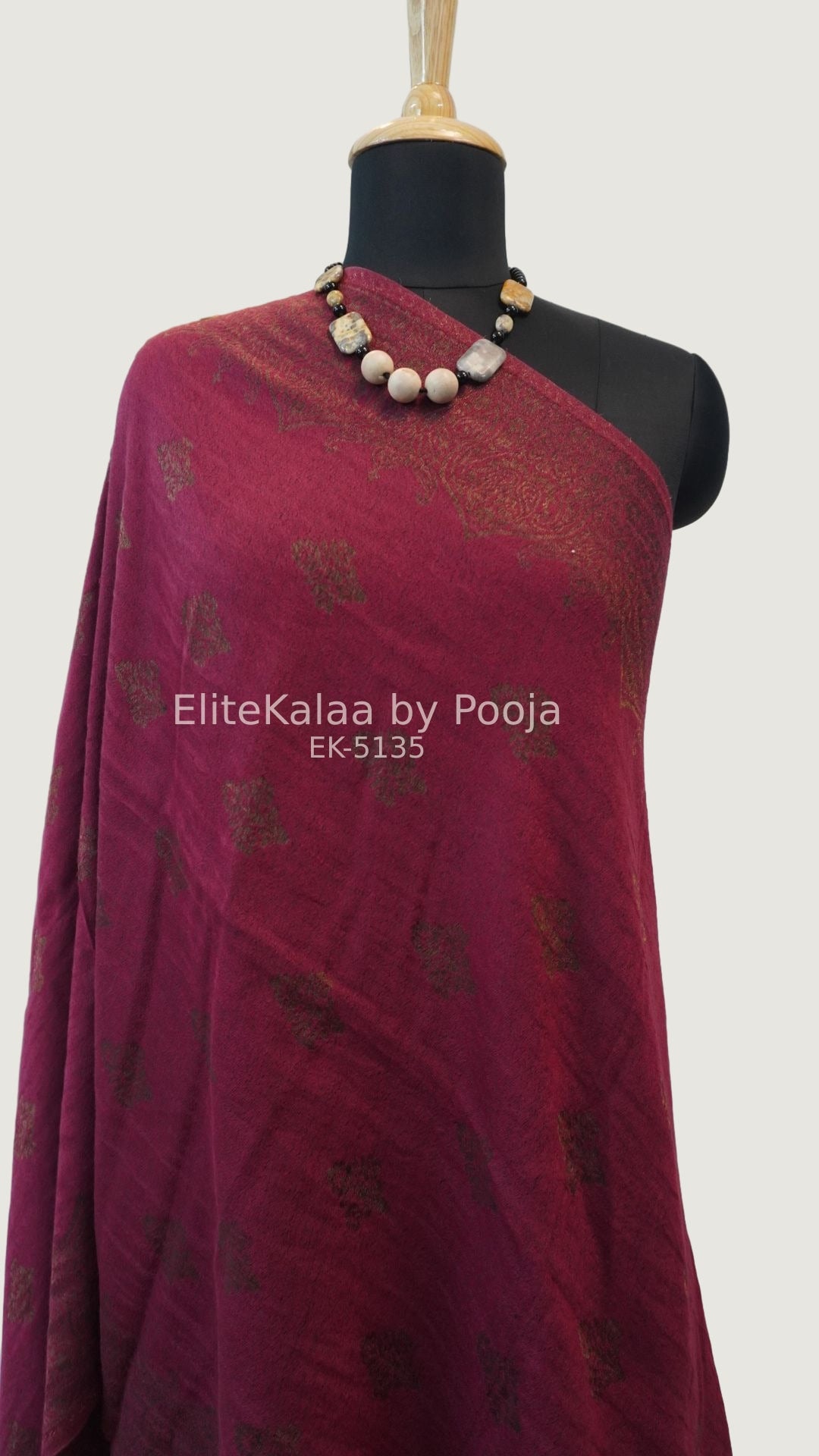 Deep maroon fine wool stole with self zari leaf design