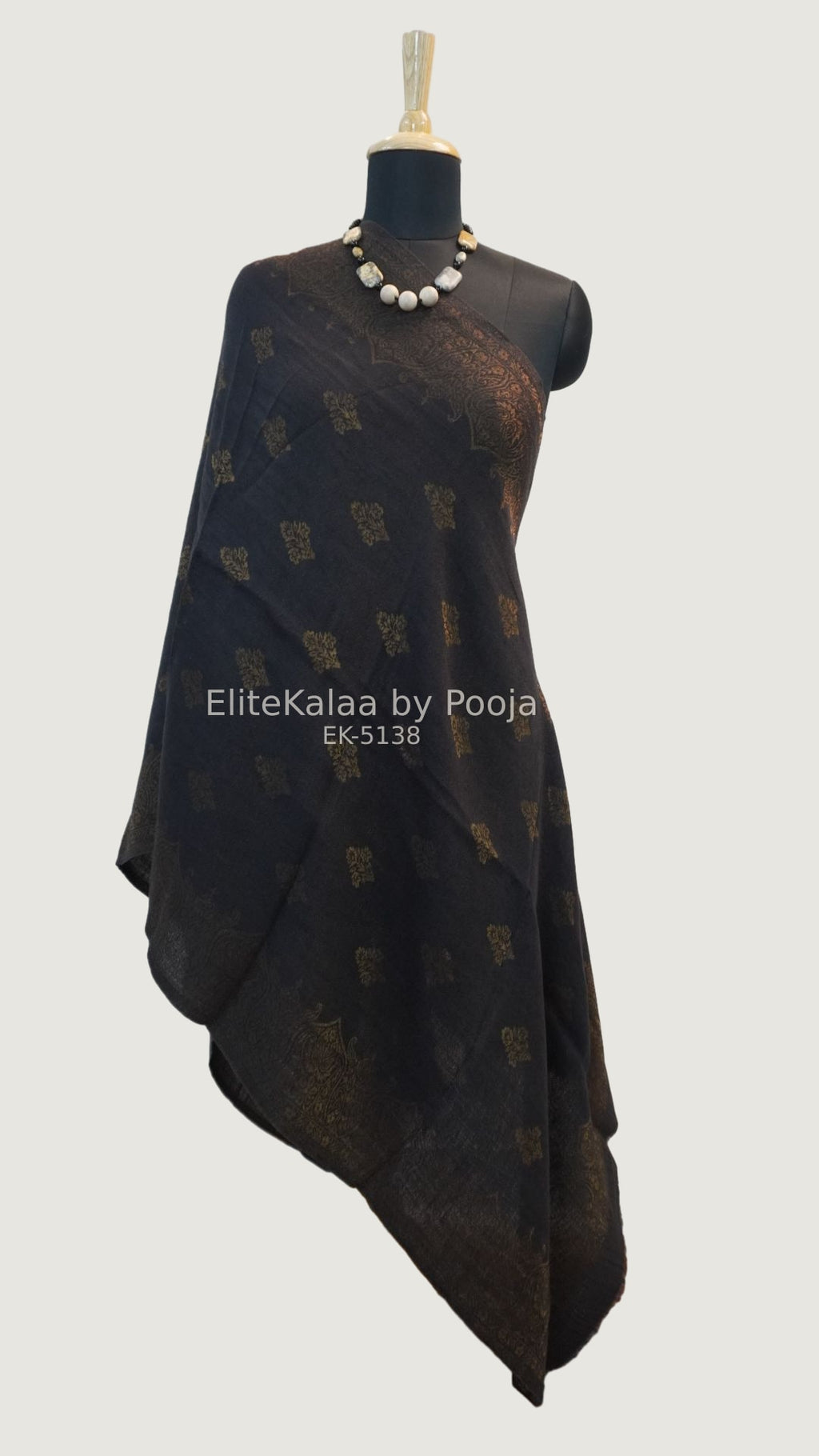 Black fine wool stole with self zari leaf design and border detail