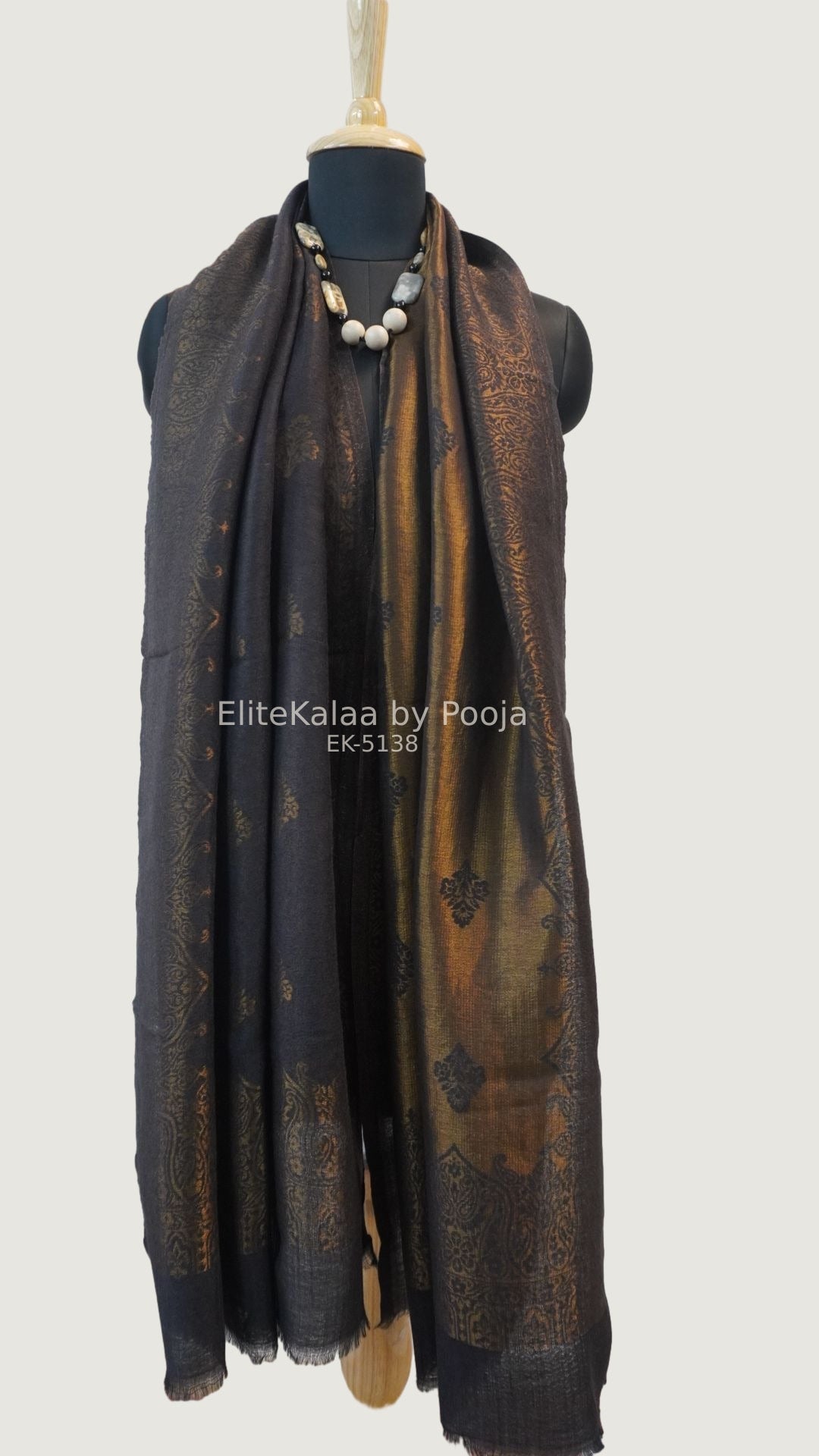 Black fine wool stole with self zari leaf design and border detail