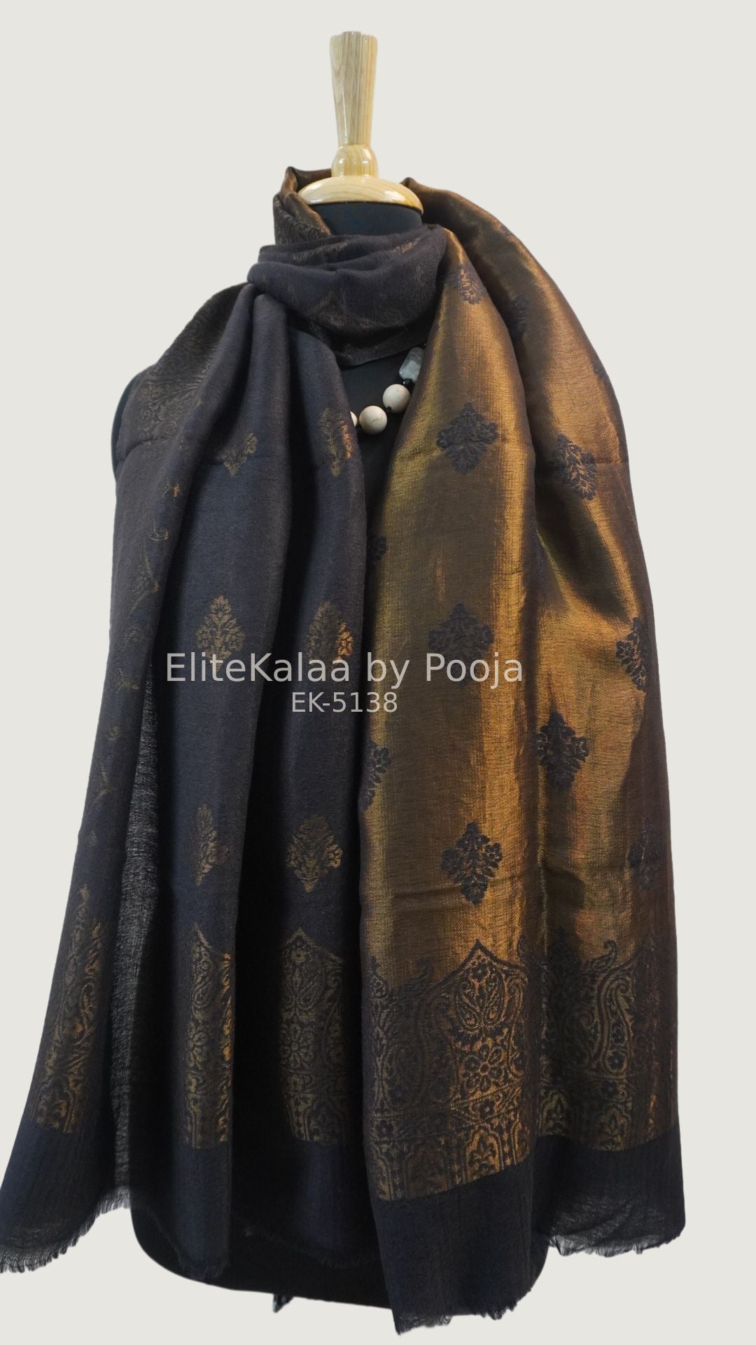 Black fine wool stole with self zari leaf design and border detail