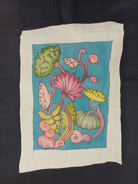 Blue Kalamkari silk patch with Kamal Alekhan floral motif and border detail