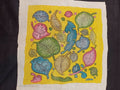 Yellow Kalamkari patch with leaf floral motif, all-over pattern and border detail
