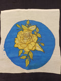 Kalamkari blue round patch with a rose design and circular format