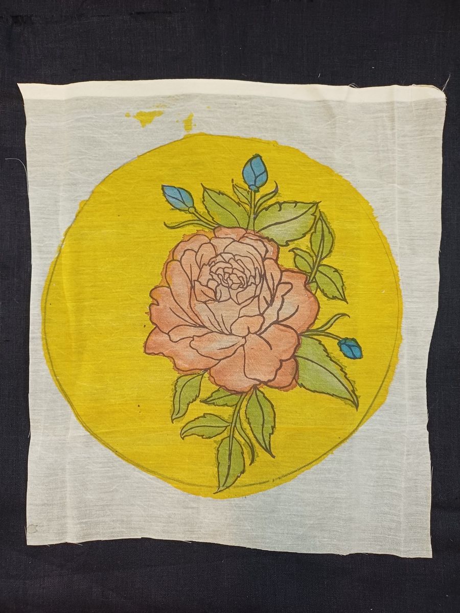 Kalamkari round patch in yellow with a rose design and border details
