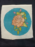 Kalamkari round patch in rose with a placement pattern and clean circular shape