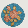 Blue circular Kalamkari textile patch with a floral design and border, 30 cm diameter