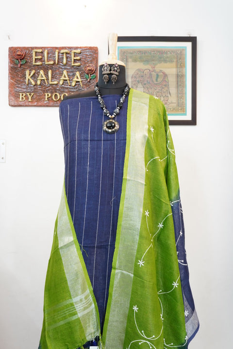 Blue and green 3 piece dress material with embroidery, border details and tassels