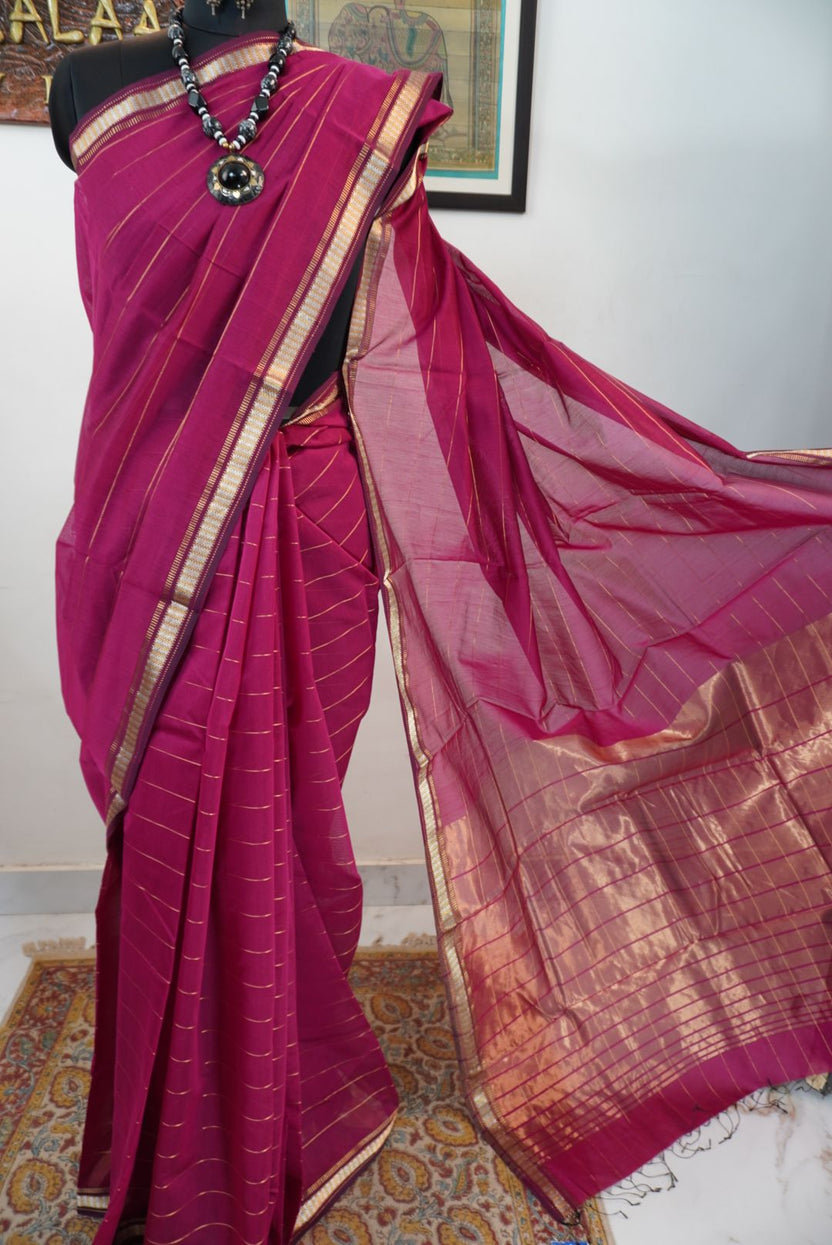 Pink striped saree with border, zari detail and fringe finish